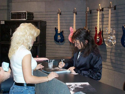 Michael Wilton of Queensryche signing autographs
