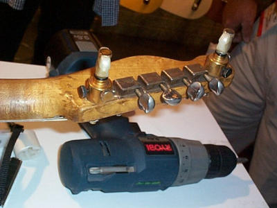 Banjo (Scruggs-Keith) tuners have replaced the two E string tuners.