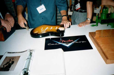 Several strikes with the keys simulate random dings and dents a well used guitar may acquire