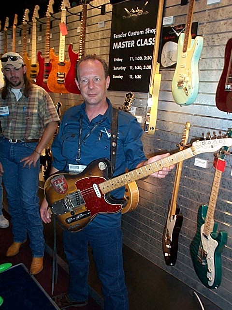 Sr. Master Builder Mark Kendrick displays Clarence Whites original Telecaster