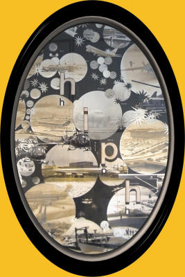 Foto's met allerlei oudheden hangt in het nieuwe OT-gebouw.