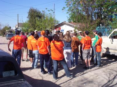 Everyone massed up, listening to instructions before fanning out in different directions to pass out free hygiene kits to those less fortunate than ourselves.