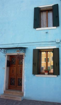 Reflecting window in Burano - Venice