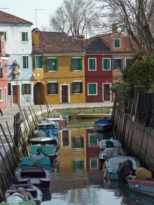 Reflection of colors in the canals in Burano IV
