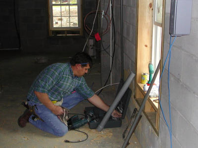 Electrician works on the feed
