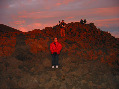 Chelle takes a seat before the sun sets.