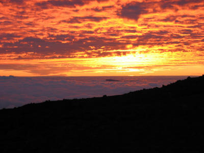 The sunset becomes more vibrant as the sun goes farther away.