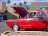 red Plymouth station wagon