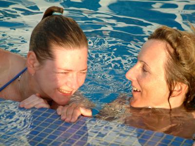 Girls Giggling In Pool