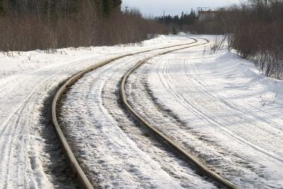 Curved train and snowmobile tracks