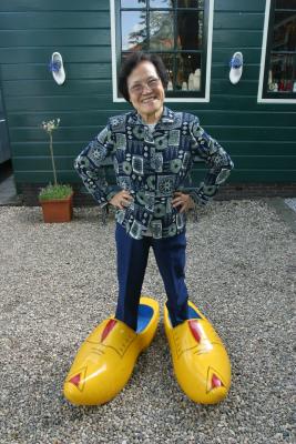 Trying onwooden shoes