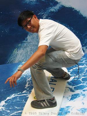 Trying out the Ralph Cool surfboard photo op