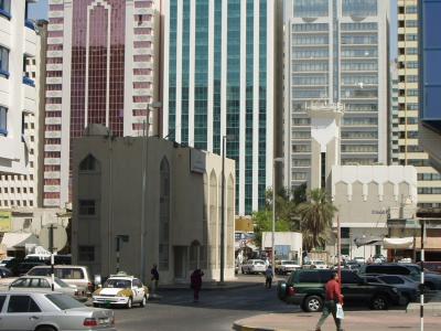 Cool little building, pink and green highrises