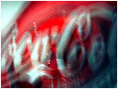 A can of Coca-Cola... cUrVe