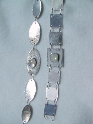 'Flash' bracelets with a moonstone set in the central panel.  SOLD