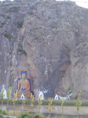 A huge Buddha image carved into the roadside from the airport to Lhasa.