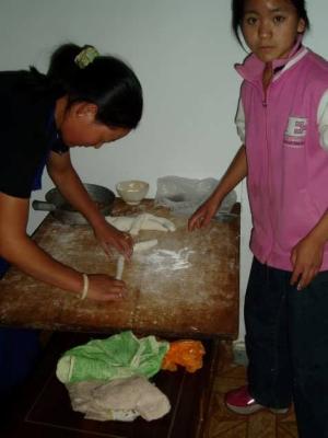 Locals making Yak Dumplings.