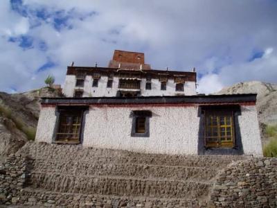 The monastry is sited along the slope of a hill.