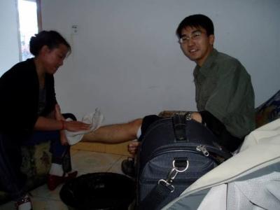 Having a foot massage at the Yangpachen hot springs.