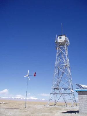 The water tower and wind turbine of the ranger station.