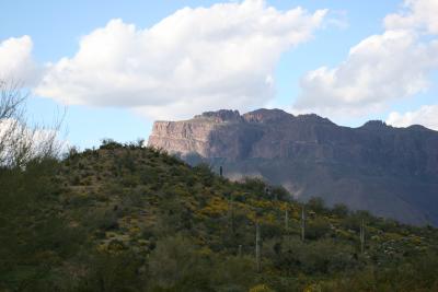 Superstition Mountain peeking over the hill.