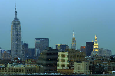 Empire State and Chrysler buildings at dusk