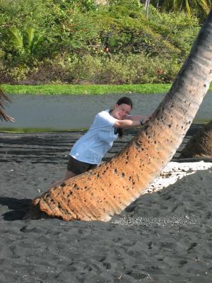 Alli pushing over a palm tree :)
