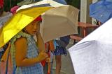 School Girl With A Golden Umbrella