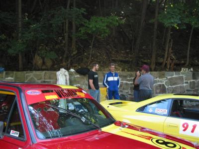 Fabio tells the other turbo MR2 driver that the best way through turn 6 is not on your roof