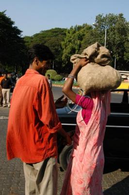 Indian woman carrying a load on her head