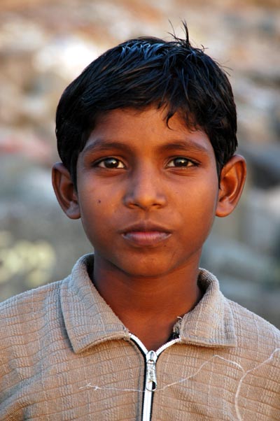 Boy at Nariman Point at sunset, India