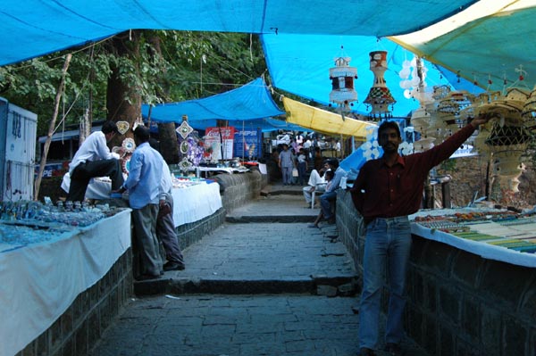 The gauntlet of souvenir stalls heading up to the caves