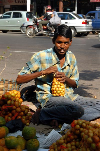 Selling fruit on Dr. D.N. Road