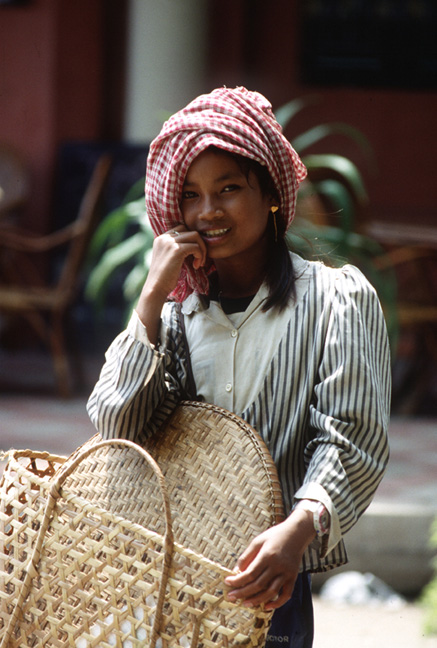  I met this girl while having lunch at streetside cafe in Phnom Penh. She wasn't selling anything, just people watching, same as me.