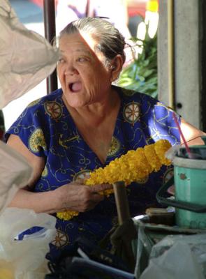 Thailand-Bangkok-Flower Vendor with experience & expression