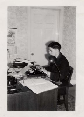 Typing at desk, 1934 (143)