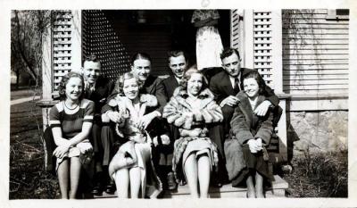Mom far right, Aunt Frances far left.   Uncles Guy , Bert, Bob, and Eli Adams in back, 1932 (142)