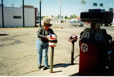 Judy cleans our helmets in Kanab, Utah