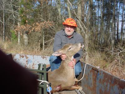 Frank with big doe at 170#'s harvested at end of shotgun season - Preston