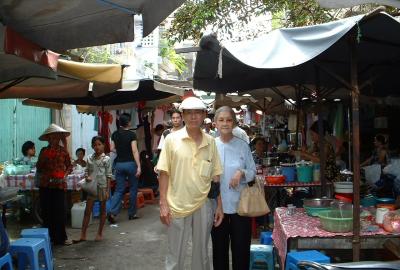 Going to the local market with Mom in 2006.