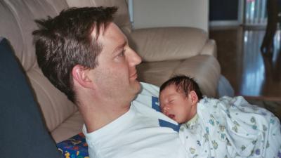 Evan catching a little snooze on Papa's chest