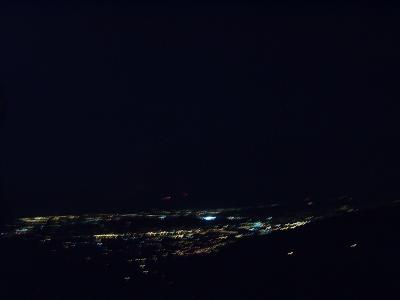 Nightime view of flames from fire