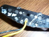 The ground strap will be removed and a third wire soldered as per 4-way switch spec.