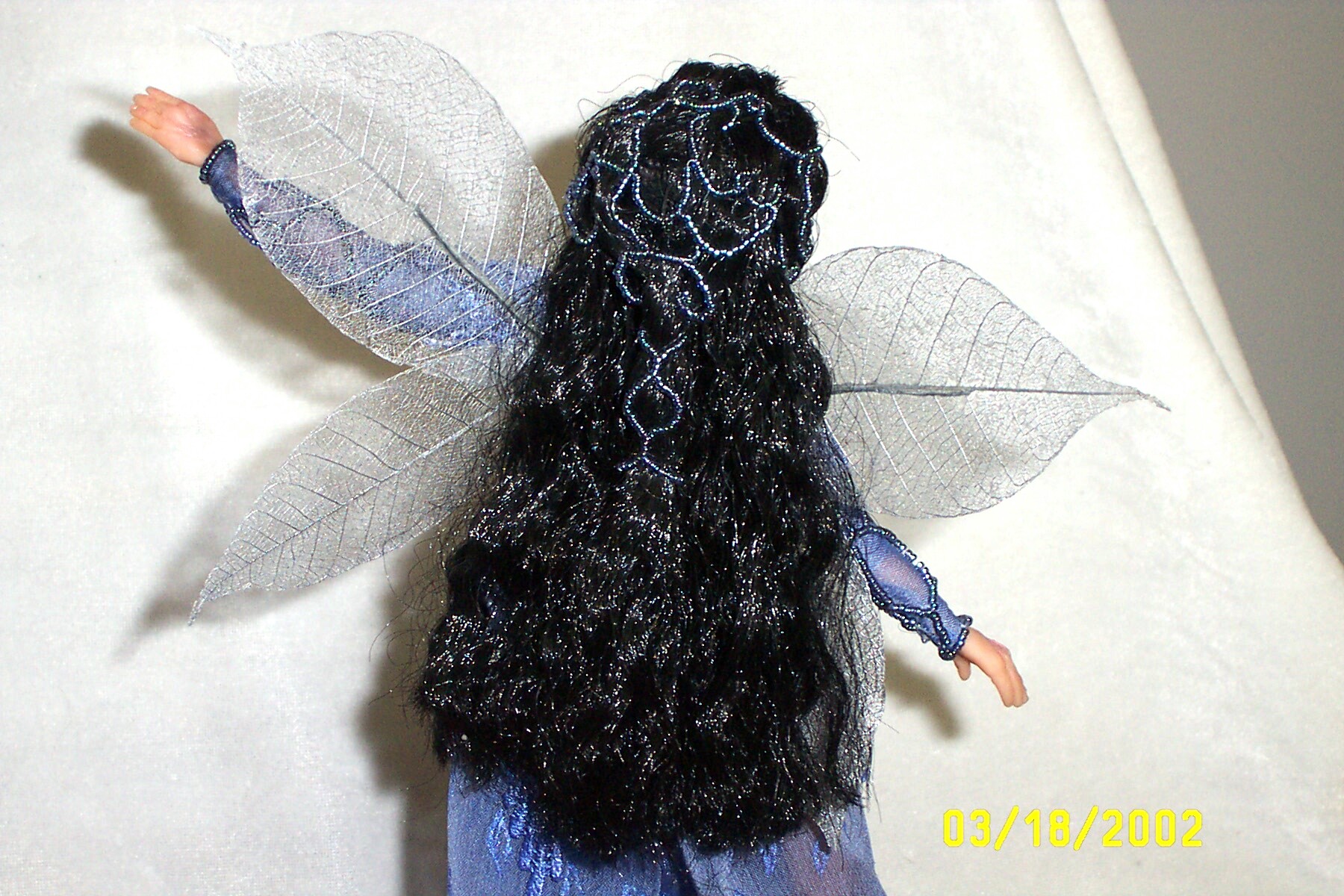 Brighton beadwork in this art dolls hair