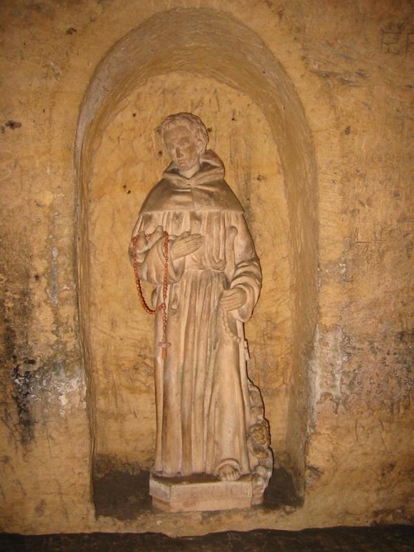 Statue not of St. Emilion (wrong type of monk) in the hermitage