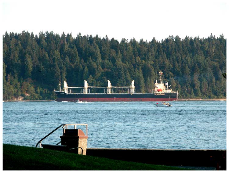 Inbound freighter, riding high.