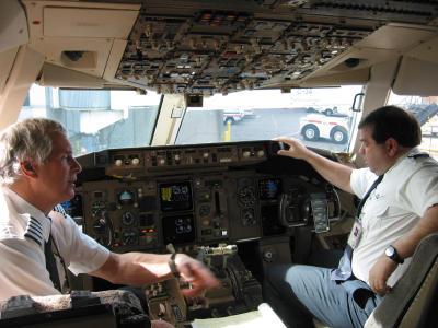 Captain Robert Blumenshine to the left and his first officer to the right in their Boeing 767-300.