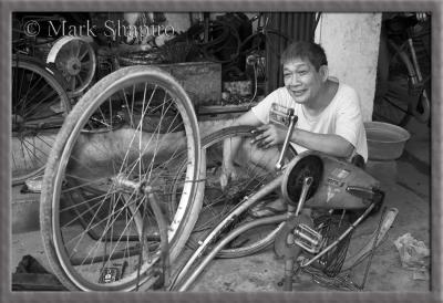 Fixing a Bike - Hanoi