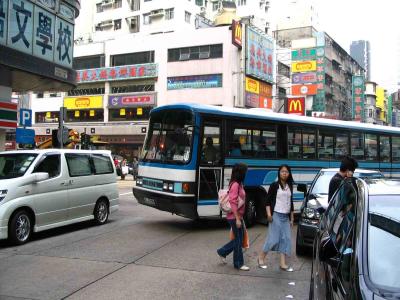 This bus was stuck.  Car parked infront and cars behind, all beeping horn...he had no where to go.