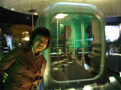 Yi and a Sightseeing Tunnel car
